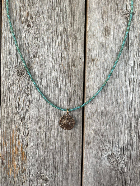 Seed Bead and Bronze Sand Dollar Charm Necklace • 17619